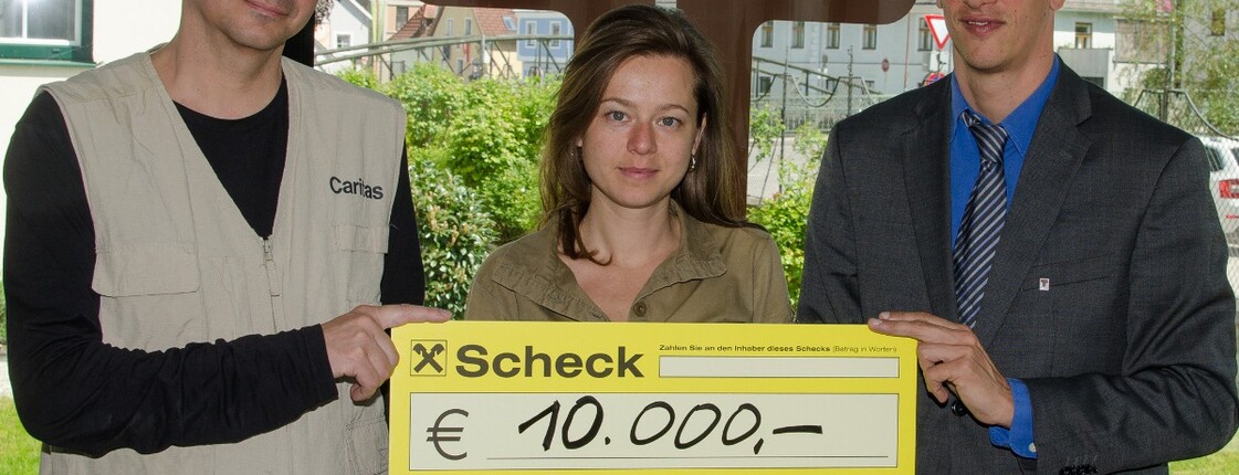 Spendenübergabe der Firma Traunfellner Spendenübergabe der Firma Traunfellner. Geschäftsführung übergibt Spendenscheck an Caritasmitarbeiter Andreas Zinggl.