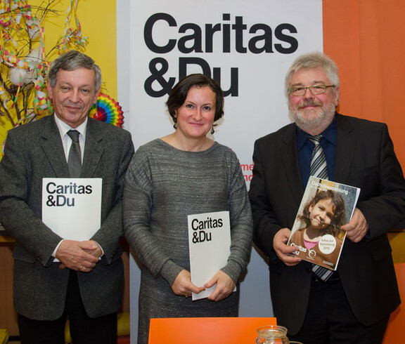 Der Direktor der Caritas St. Pölten und zwei weitere MItarbeiter bei Kinderkampagne