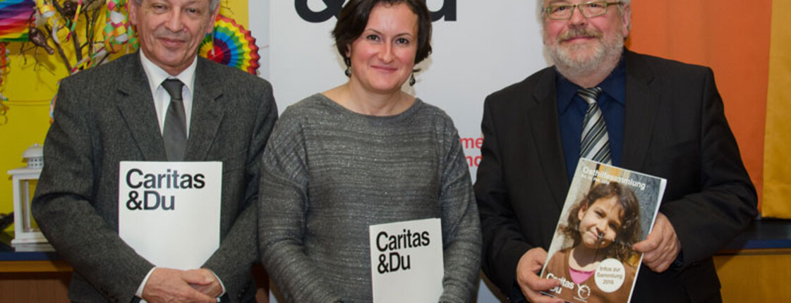 Der Direktor der Caritas St. Pölten und zwei weitere MItarbeiter bei Kinderkampagne